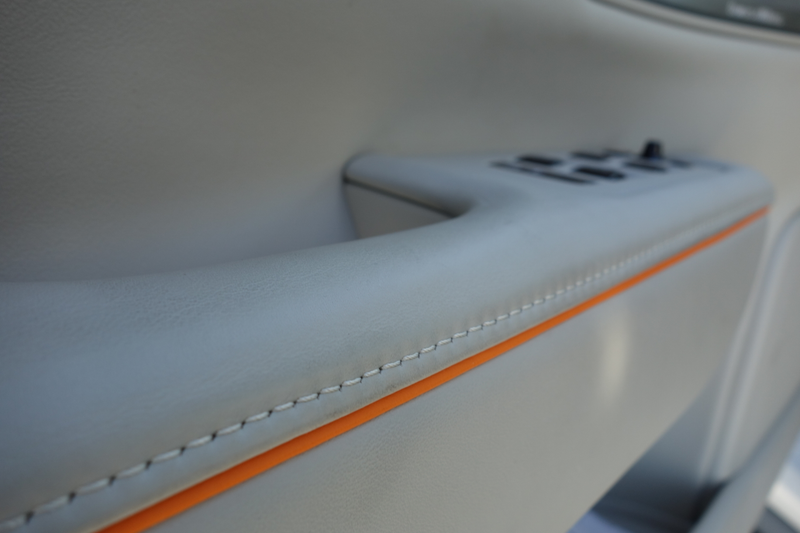 Illustration for article titled The Volvo V90 Cross Country Has Orange Seatbelts and a $3,300 Cargo Box and I Love It